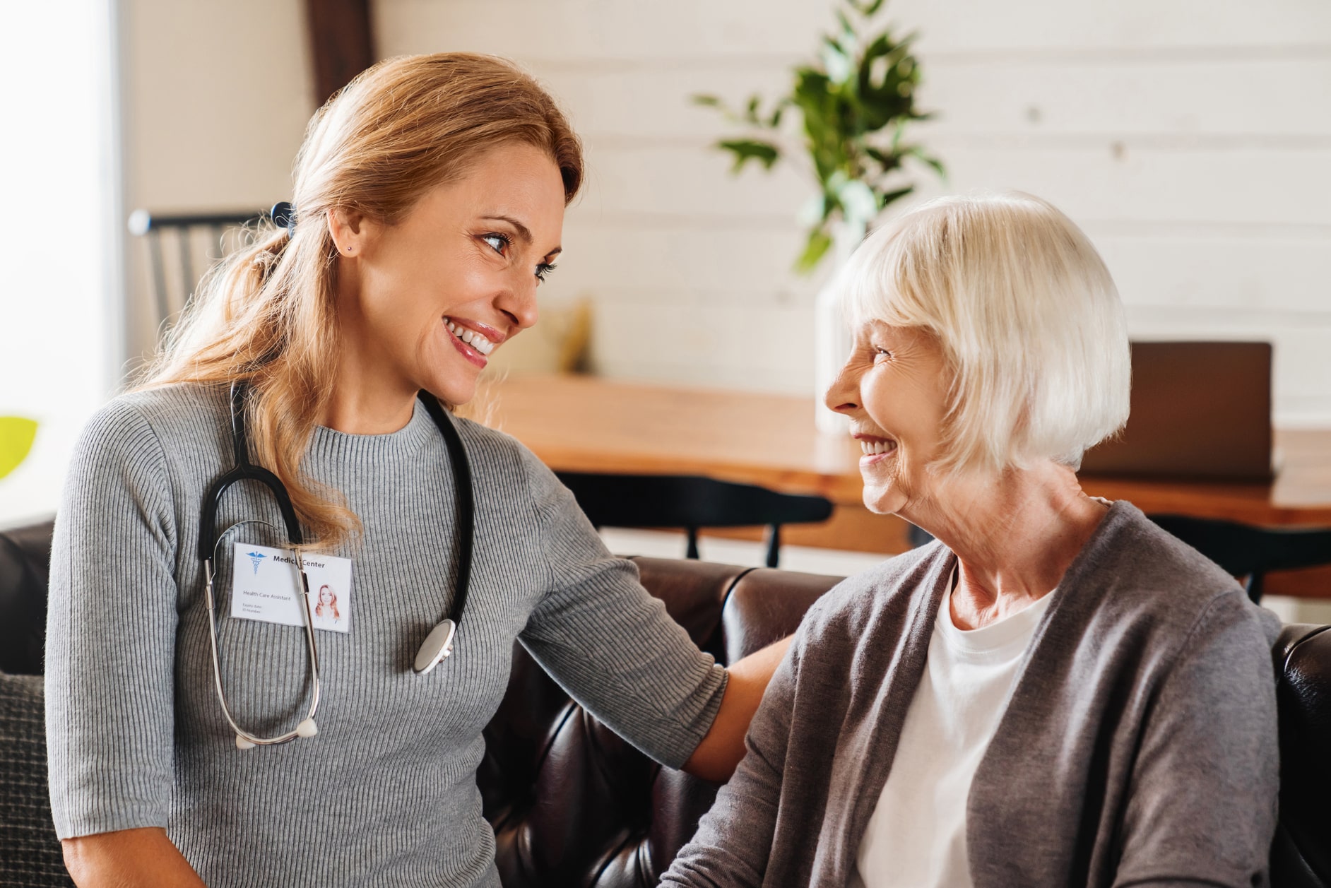 nurse talking to elderly patient